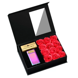 Detail view of gift box set with 12 red soap flowers, lighter, and cable in flip-top window box