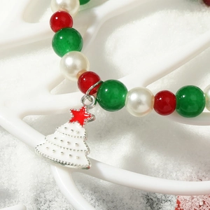 Christmas beaded bracelet with red green white pearls and a festive tree charm
