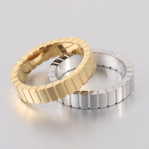 Detailed close-up showing the polished rectangular ice cube texture of metal rings