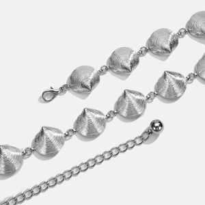 Fashionable silver metal waist chain featuring shell pendants and adjustable lobster clasp