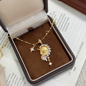 Elegant 18k gold plated unicorn necklace with pink pear-shaped gemstone in a gift box