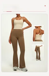 Detail of cross-back yoga top and high-waisted flare pants in premium elastic fabric
