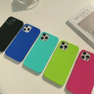 Detailed row of five neon silicone iPhone cases with matte finish and precise camera cutouts