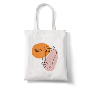 White canvas tote bag featuring minimalist face line art with abstract geometric shapes