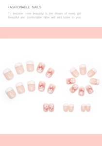 Short nude pink gradient press-on nails with white cherry blossom and French tip designs