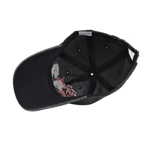 Detail view of cotton baseball cap interior showing 100% cotton label and stitching