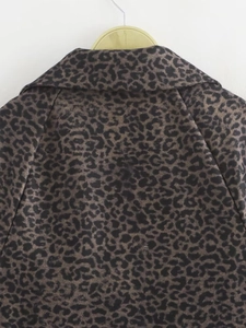 Detail of leopard print coat collar and shoulder fabric texture in French style