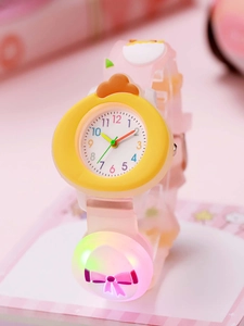 Macro shot of luminous chicken kid watch with pink strap and glowing light feature
