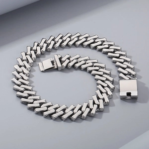Detailed view of silver titanium steel 20mm Cuban link chain with a secure box clasp