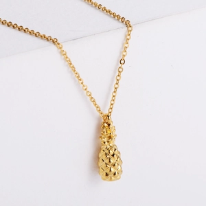 Minimalist gold plated pineapple pendant necklace set with textured tropical fruit charm