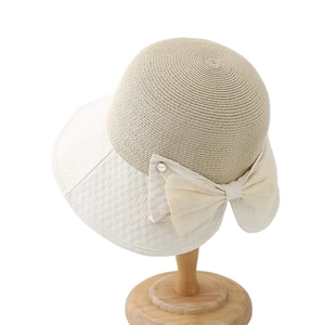 Japanese style sun hat with wide brim, back slit bow design and straw texture