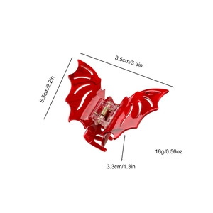 Creative red bat-shaped hair claw clip for Halloween and Christmas hair styling