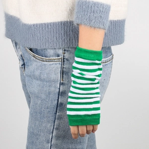 Detail of green and white striped knit arm warmers showing texture and fingerless design