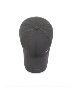 Close-up of deep gray baseball cap with CLASSIC embroidery and metallic side detail