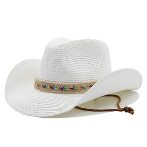 White woven straw cowboy hat with rainbow band and adjustable brown chin strap