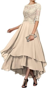 Detail of floral lace embroidery on champagne dress with elegant sheer mesh sleeves