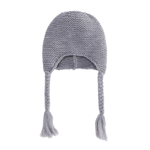 Detailed knit pattern of a gray winter baby hat with earflaps and woven tassels