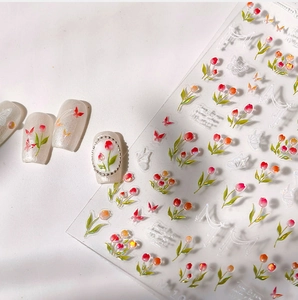Detail of 3D embossed tulip and butterfly nail stickers with floral adhesive nail art decals