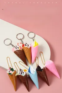 Top view of miniature ice cream cone keychains with diverse colors and metal rings