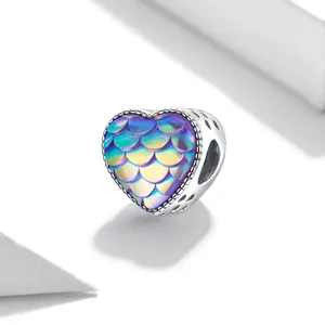 S925 sterling silver heart charm with blue-purple fish scale texture and hollow patterns