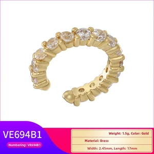 Detail of C-shaped gold ear cuff featuring micro-pave cubic zirconia, 17mm length