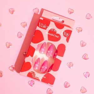 Pink cat-eye press-on nails for Valentine's Day with almond shape heart patterns