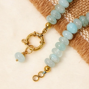 Elegant aquamarine natural crystal beaded necklace with a golden round spring clasp