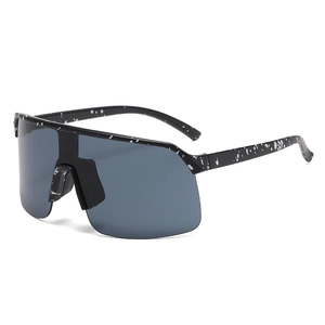 Cycling sunglasses with black and white splatter frame and dark grey lenses for sports