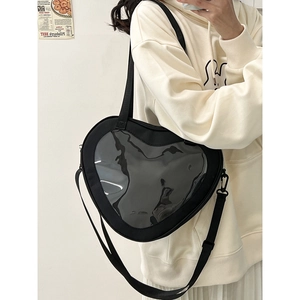Minimalist heart-shaped ita bag with transparent window and adjustable black straps