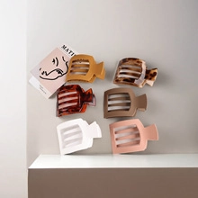 Set of six colorful acrylic hair claw clips with minimalist hollowed design