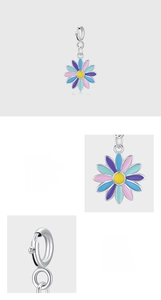 Macro shot of 925 sterling silver colorful enamel daisy pendant with flower petal details