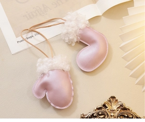 Pink satin Christmas glove and sock ornaments with white faux fur trim and hanging loops
