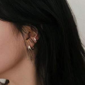 Minimalist 925 silver geometric hoop earrings and ear cuff set shown on a female model
