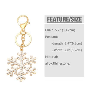 Detail view of snowflake keychain with dimensions showing gold alloy and white rhinestones