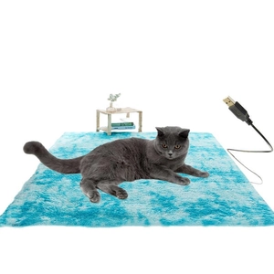 Detailed view of plush turquoise pet heating mat with USB connector for small pets