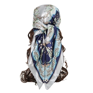 Silver square silk scarf with floral lily of the valley print and blue geometric border
