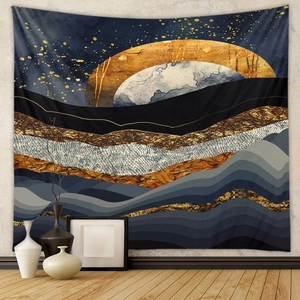 Detail of abstract landscape tapestry featuring blue mountain peaks and golden sun patterns