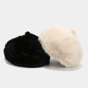 Chic winter plush beret hats in black and oatmeal colors with soft faux fur texture
