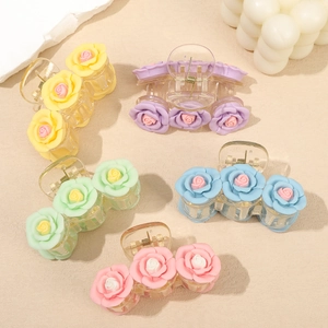 Five assorted colors of pink camellia flower hair claws with a sweet Japanese aesthetic