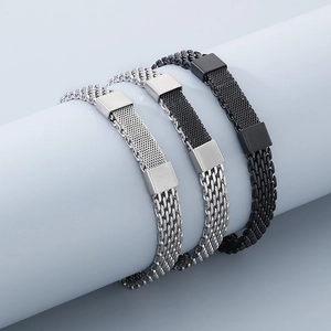 Detail of woven stainless steel snake chain bracelets in silver, black, and two-tone finishes