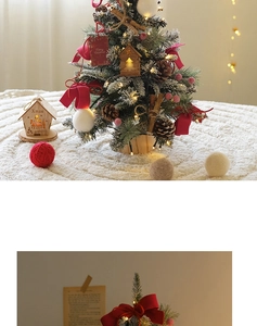 Close-up of mini PE Christmas tree with red bows, pine cones, and warm LED fairy lights