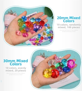 Detailed comparison of 20mm and 30mm colorful acrylic gems held in a palm for size scale