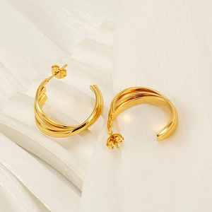 Boucles d'oreilles créoles torsadées géométriques vintage en acier titane doré 18K