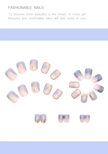 Detail of short square press-on nails with cream blue hearts and purple glitter finish