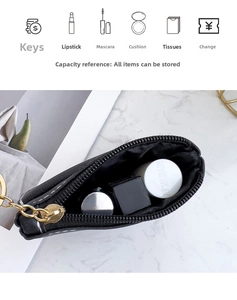 Compact black key pouch showing capacity for lipstick, coins, and small makeup essentials