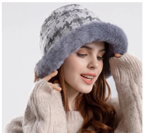 Detail of winter checkered bucket hat featuring thick grey plush trim for warmth