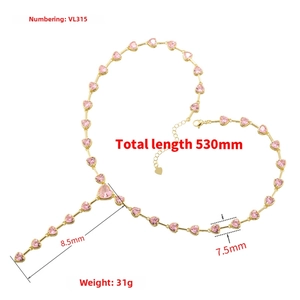 Close-up of elegant pink heart gemstone necklace with adjustable gold-plated chain links