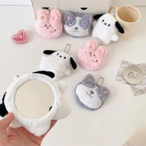 Close-up of cute plush animal cartoon mirrors featuring round glass for makeup