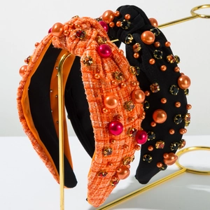 Detailed view of tweed and fabric knot headbands with pearls and rhinestones