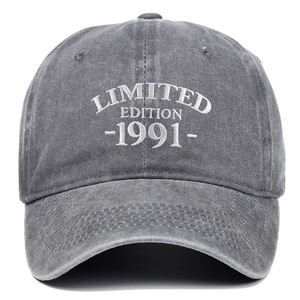 Close-up of white 1991 Limited Edition embroidery on dark gray washed cotton baseball cap